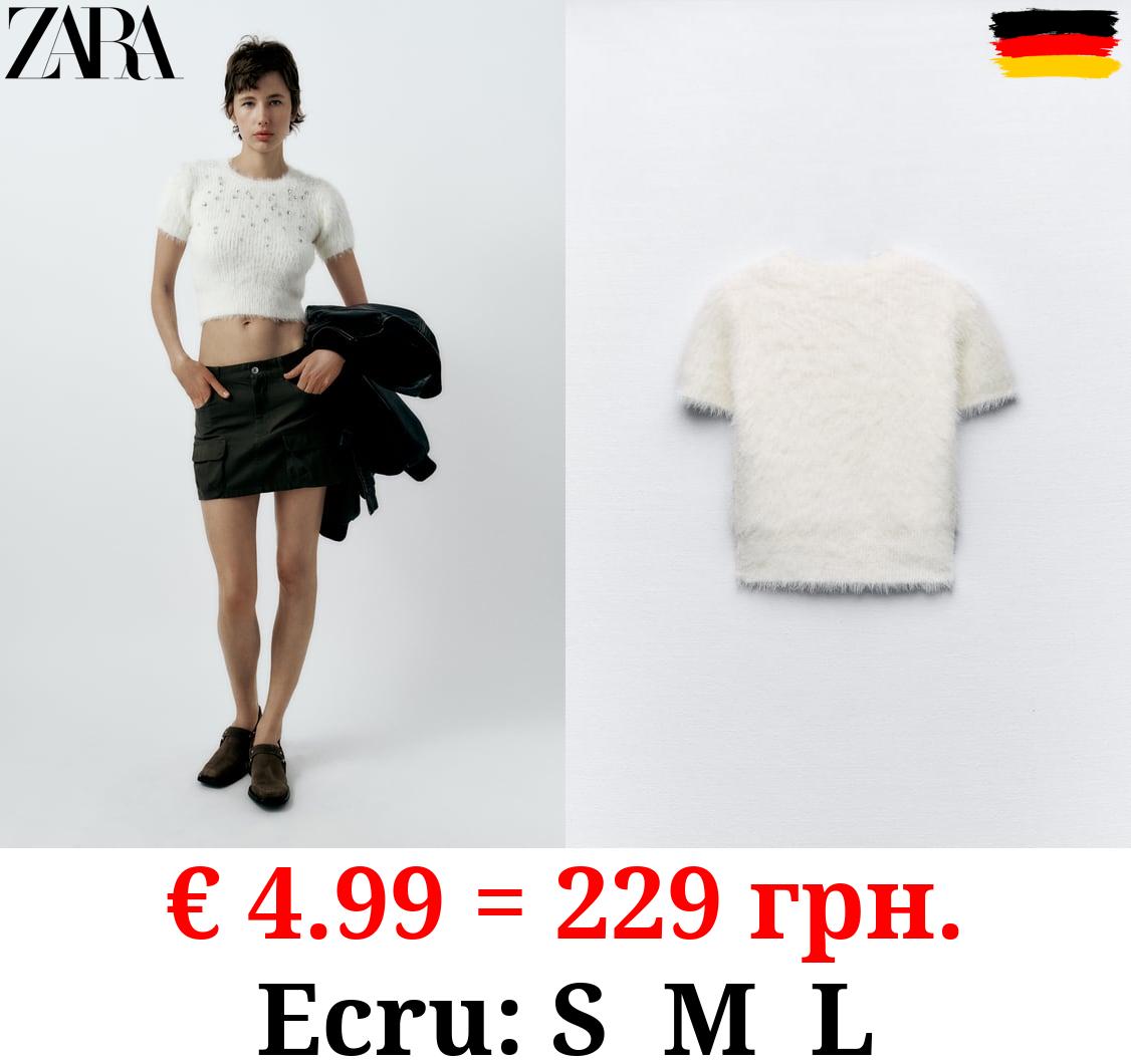 FAUX FUR SWEATER WITH RHINESTONES