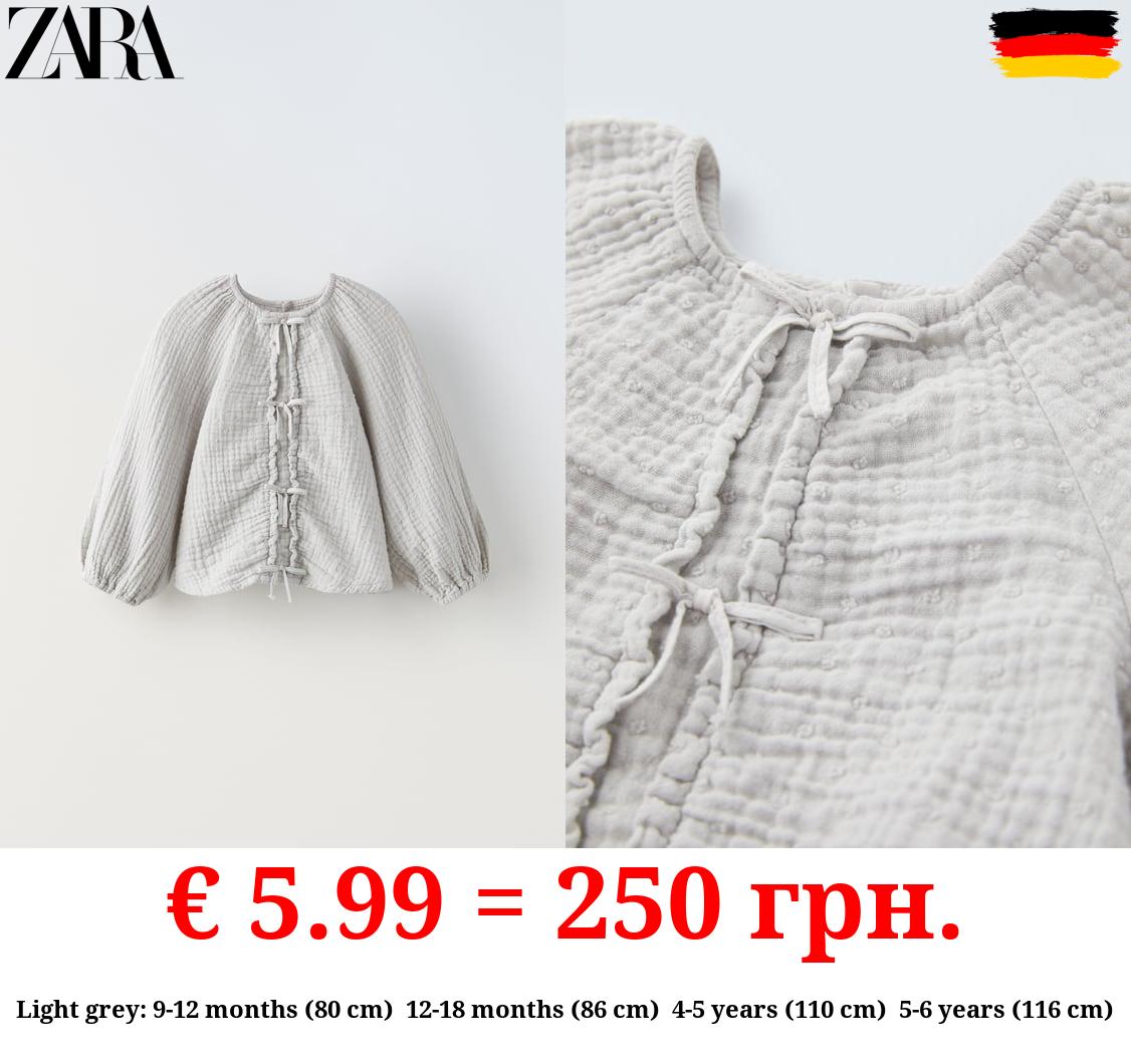 DOTTED MESH BLOUSE WITH BOWS