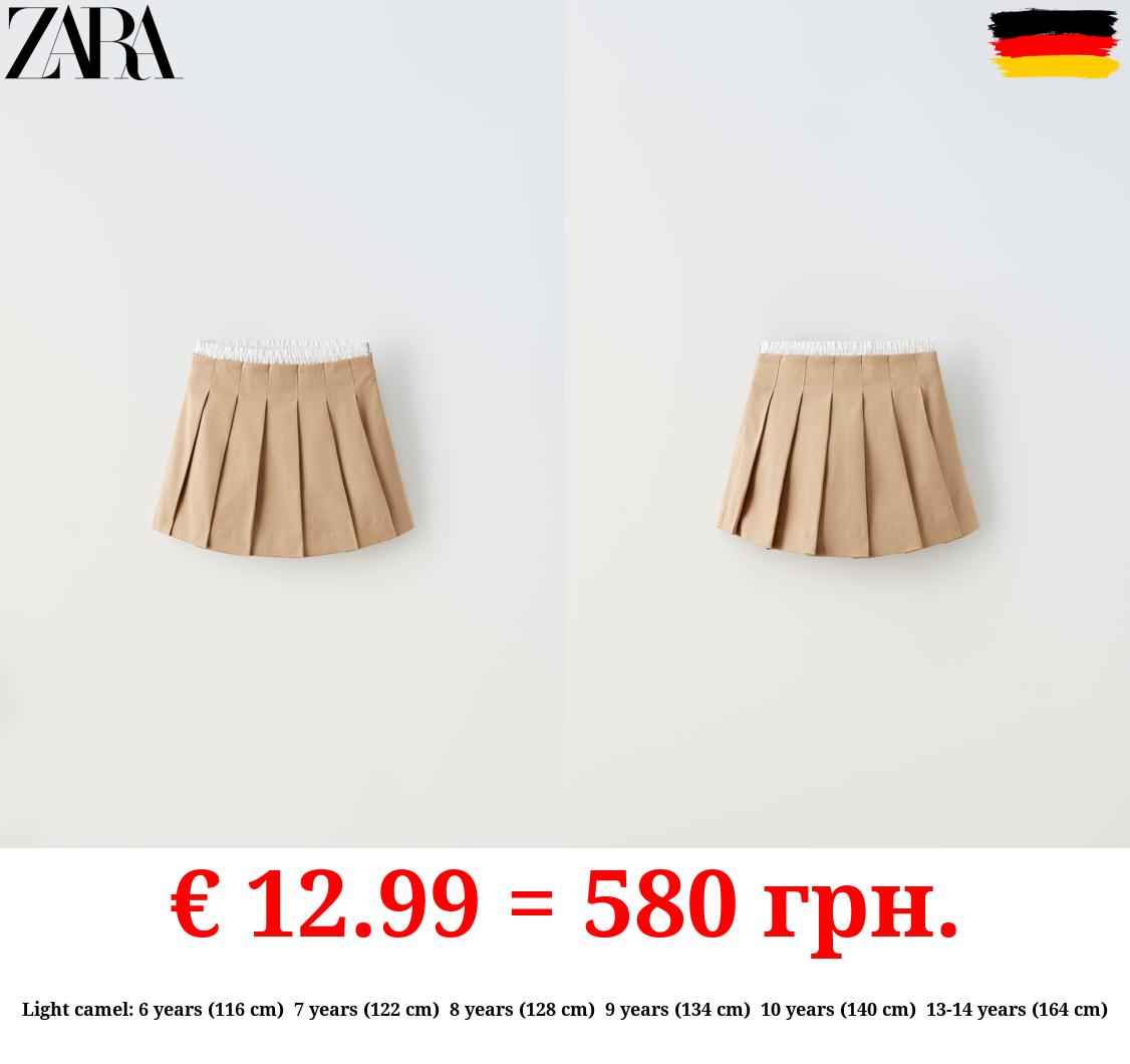 CONTRAST PLEATED SKIRT