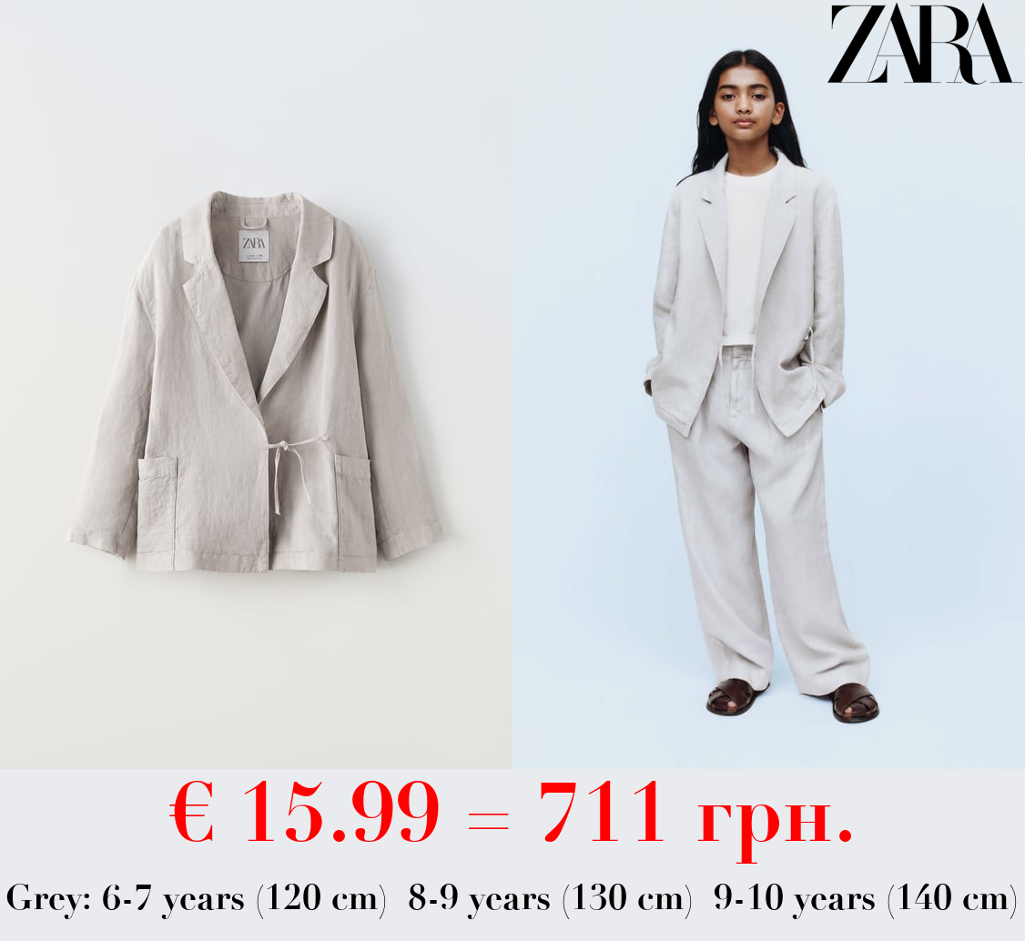 CROSSOVER BLAZER WITH TIE DETAIL