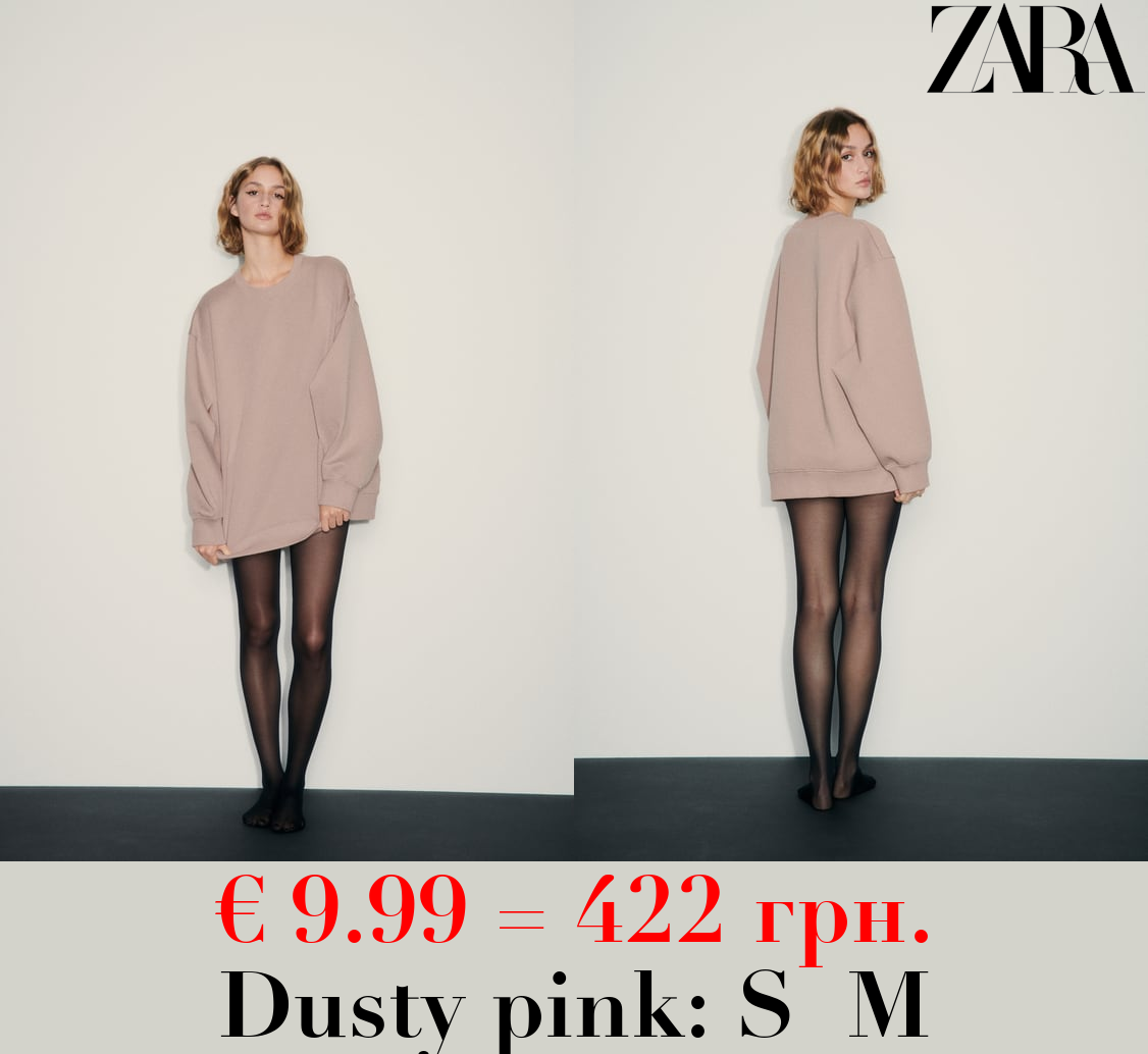 OVERSIZE INTERLOCK SWEATSHIRT WITH OPENING DETAIL