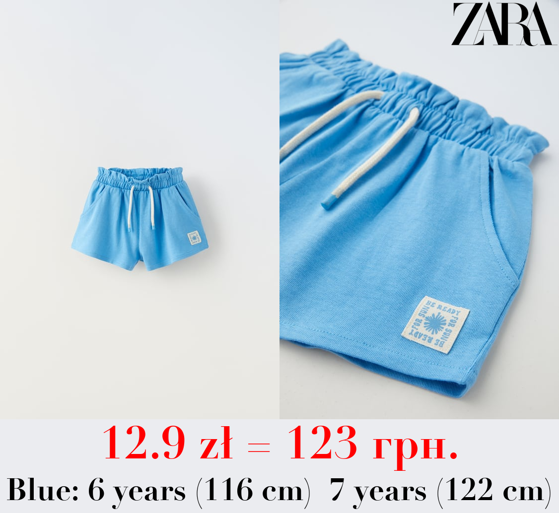 PLUSH BERMUDA SHORTS WITH LABEL DETAIL