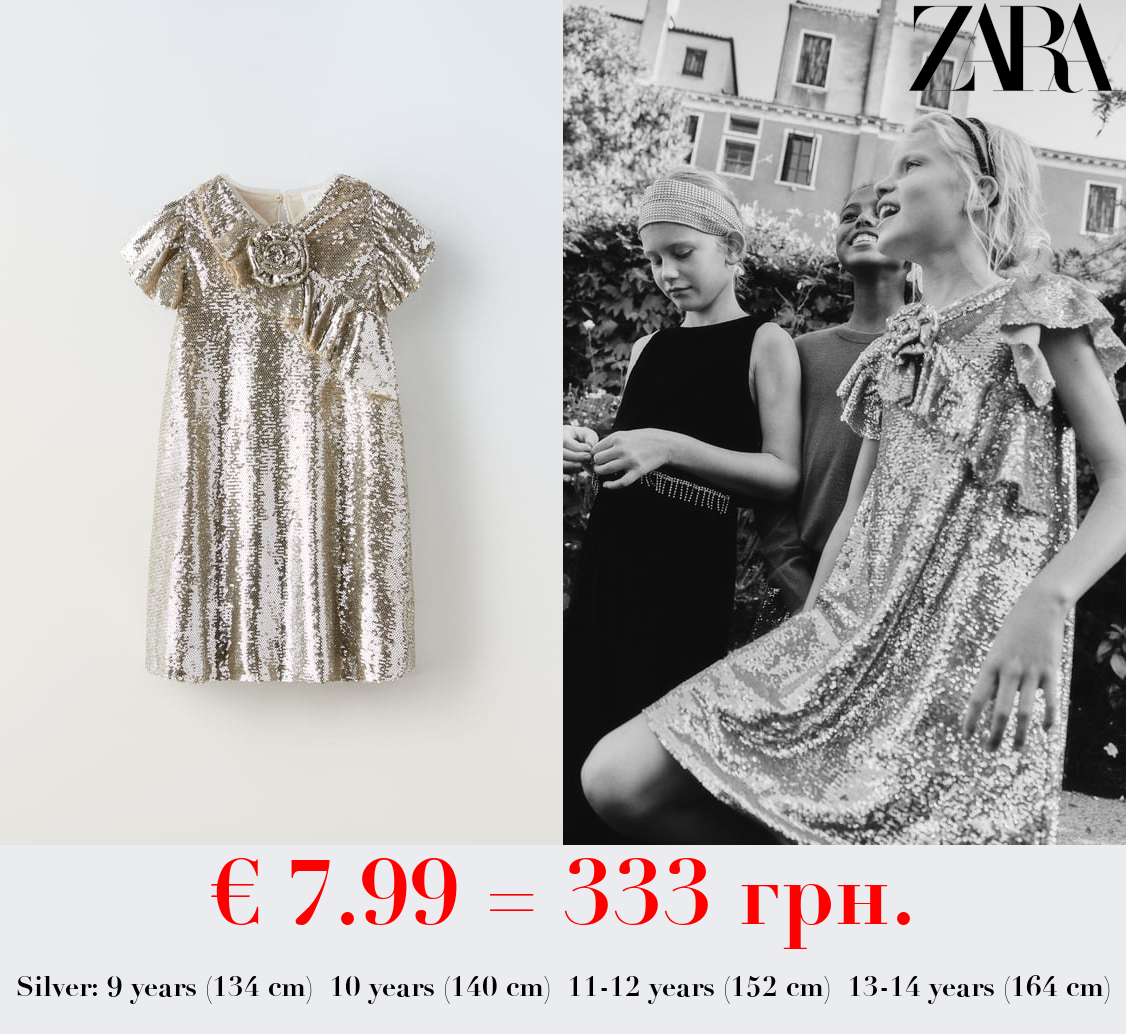 SEQUINNED DRESS WITH FLOWER