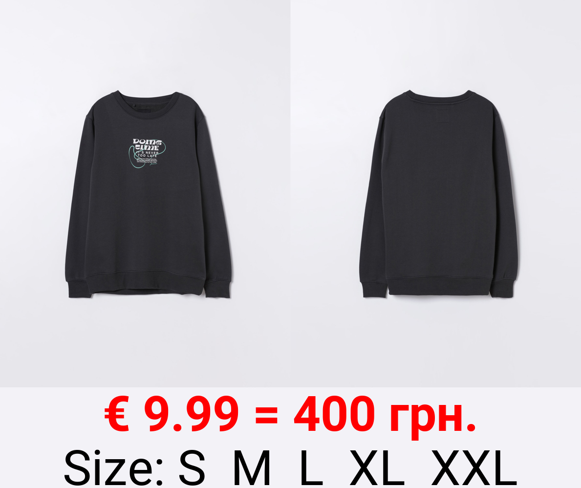 Sweatshirt with printed slogan