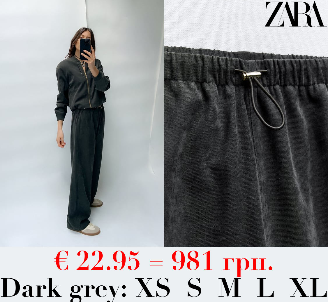 WIDE-LEG TROUSERS WITH ELASTIC WAISTBAND