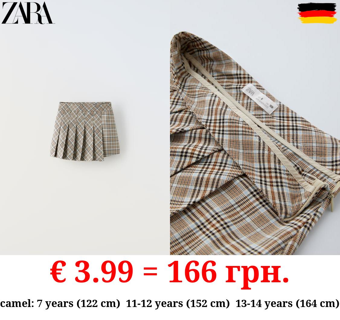 ASYMMETRIC BOX PLEAT SKIRT