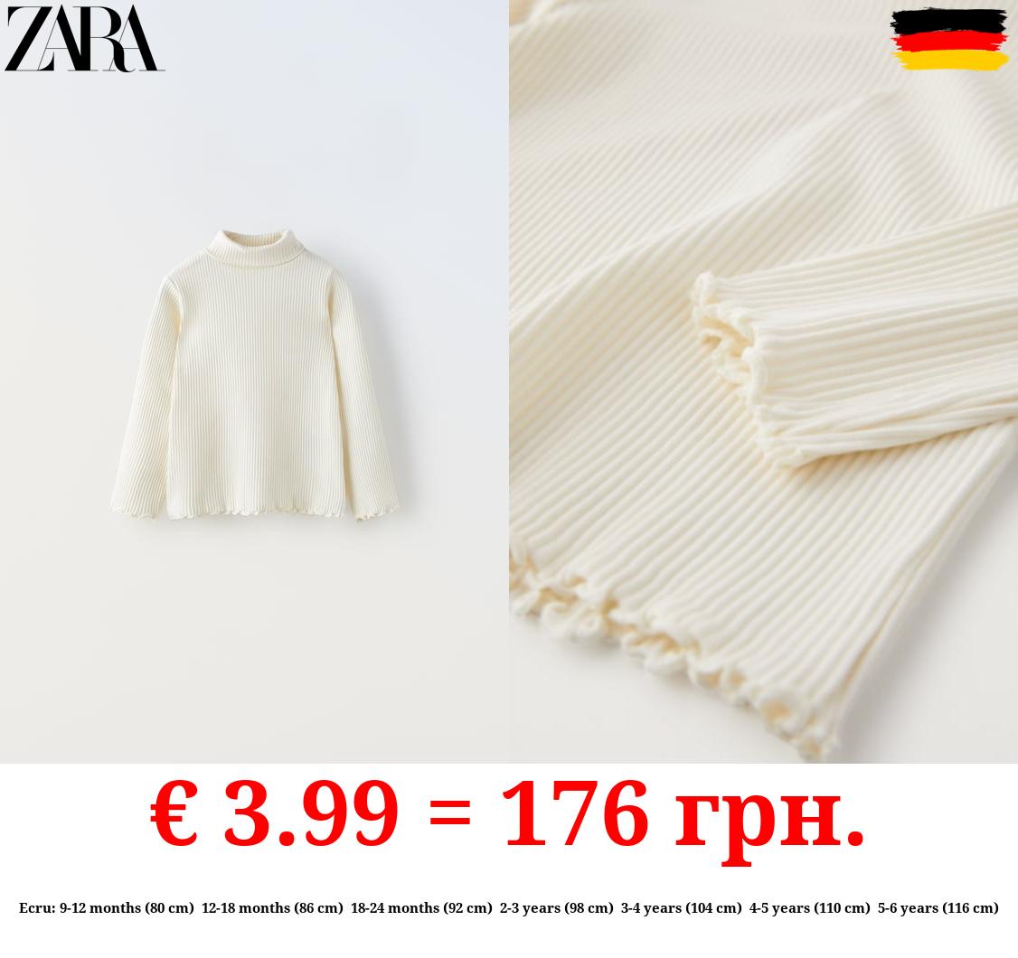 RIBBED TOP WITH SCALLOPED DETAILS