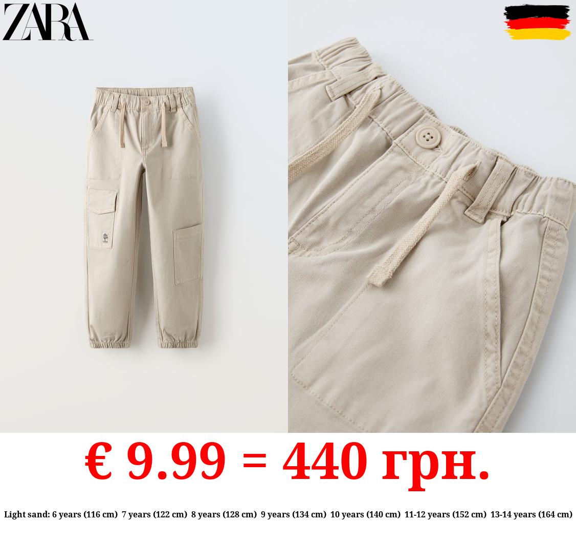 CANVAS TROUSERS WITH POCKETS