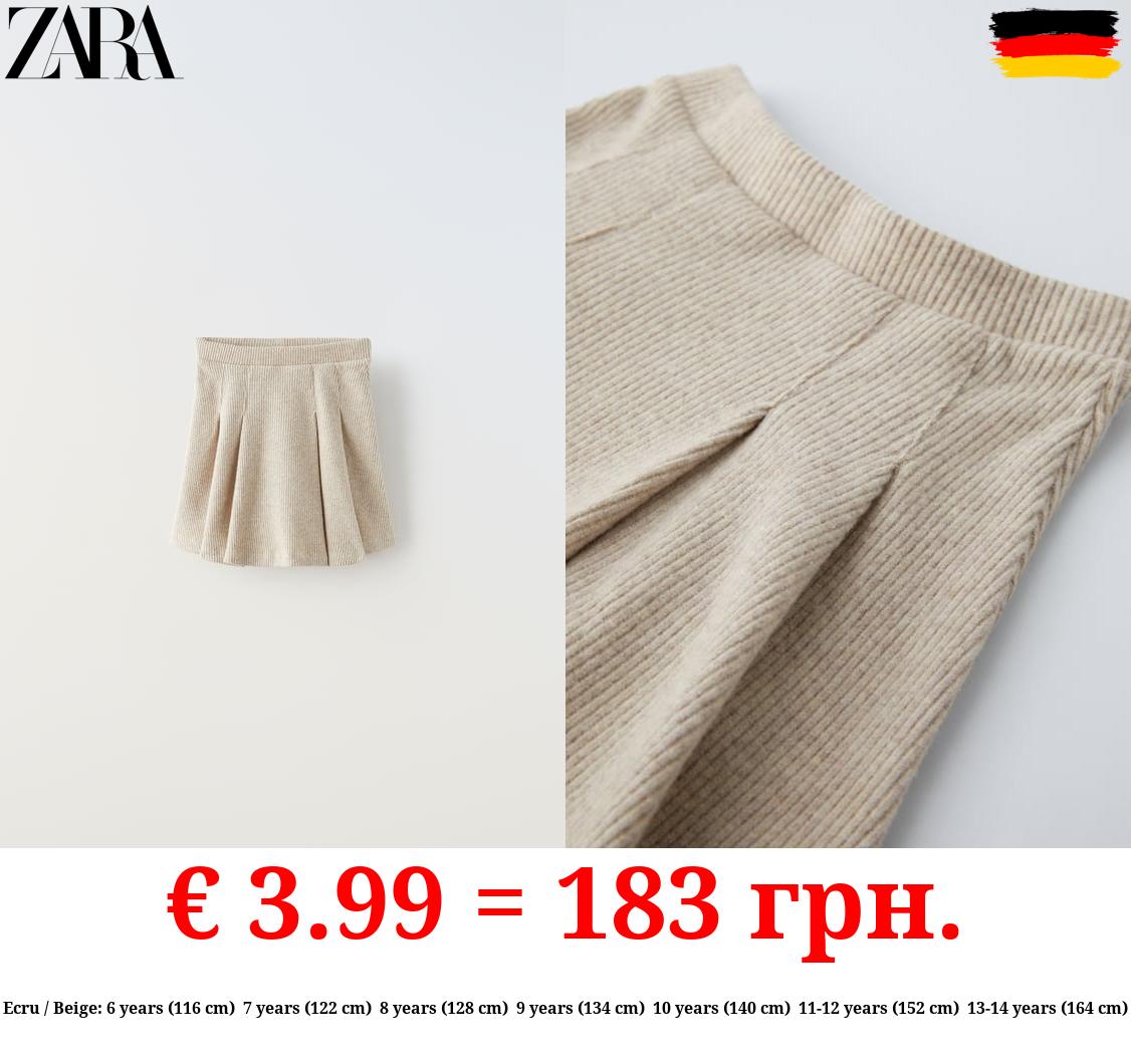 SOFT TOUCH BOX PLEAT SKIRT