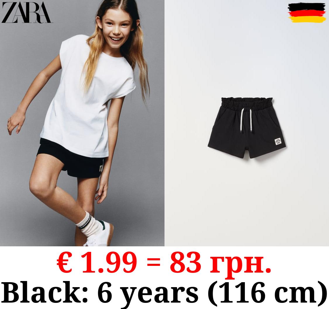 PLUSH BERMUDA SHORTS WITH LABEL DETAIL