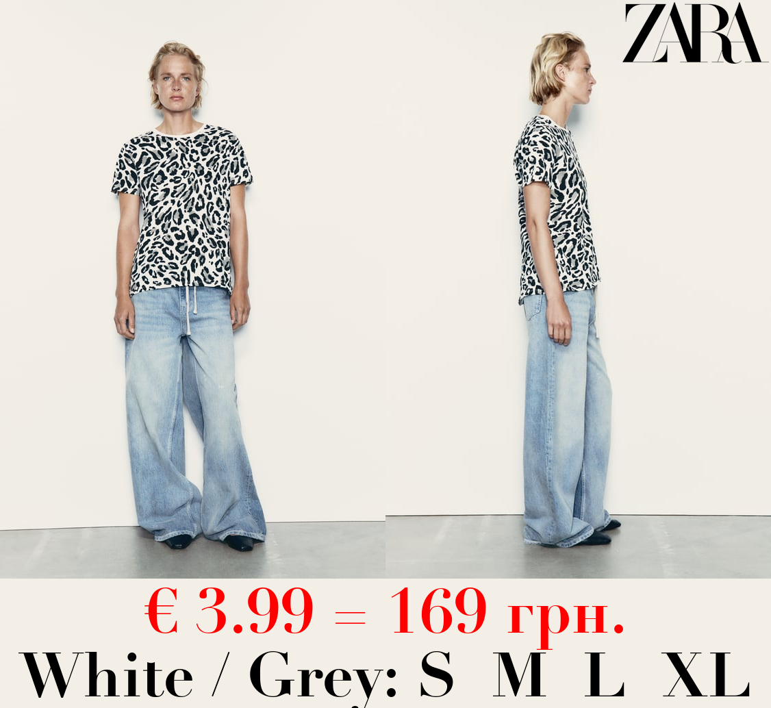 BASIC T-SHIRT WITH ASYMMETRIC HEM