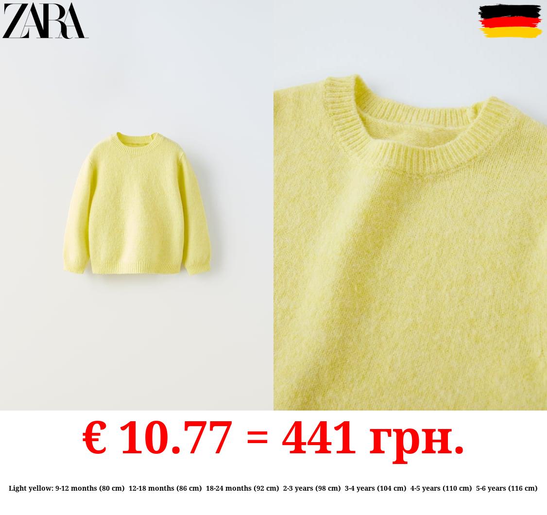 SOFT TOUCH KNIT SWEATER