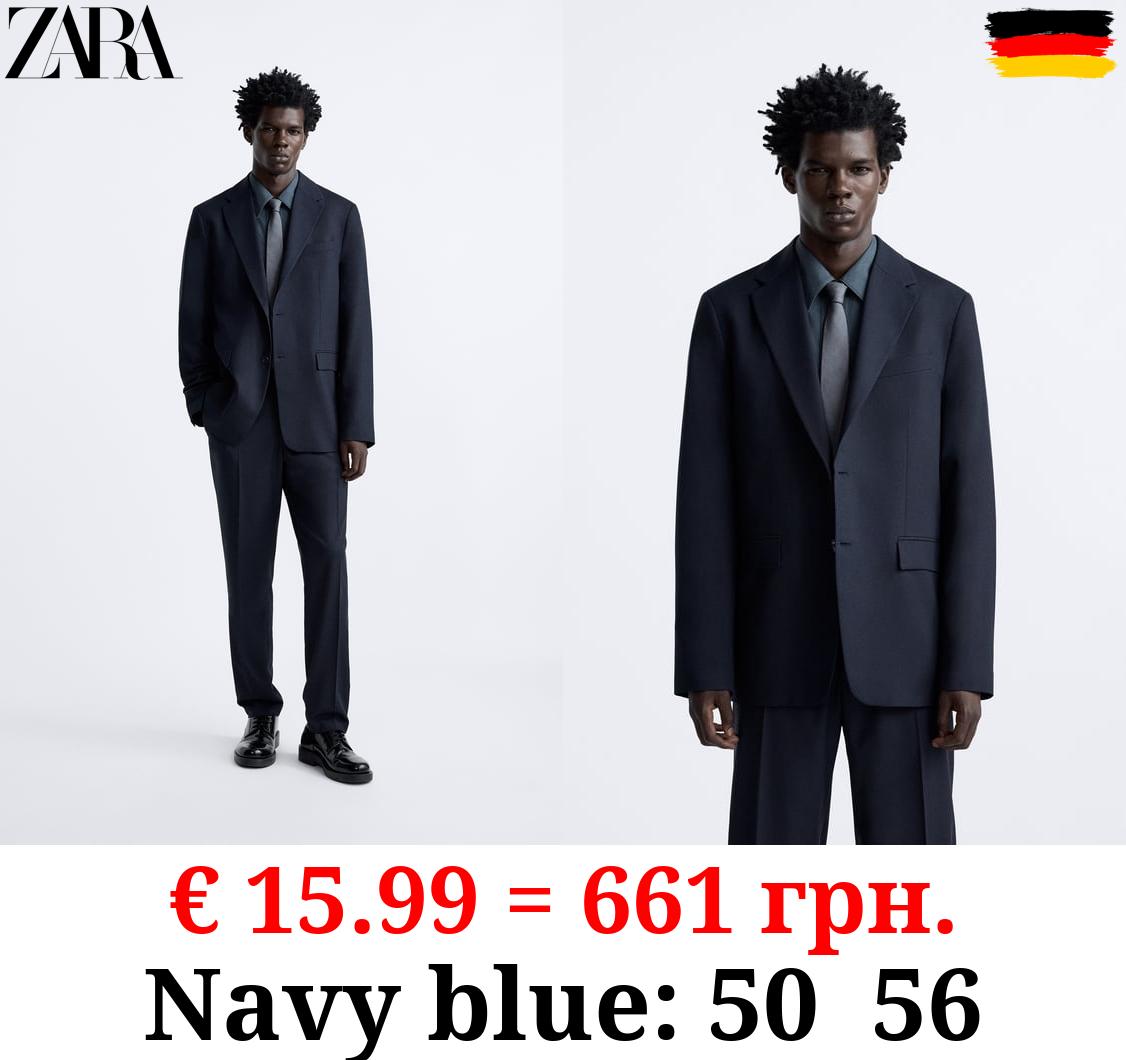 TEXTURED SUIT BLAZER