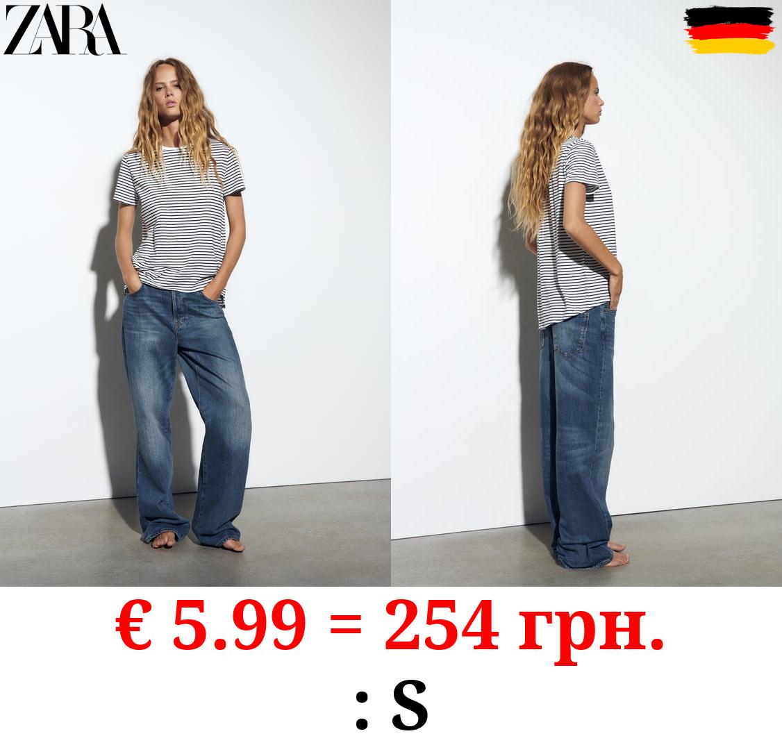 BASIC T-SHIRT WITH ASYMMETRIC HEM