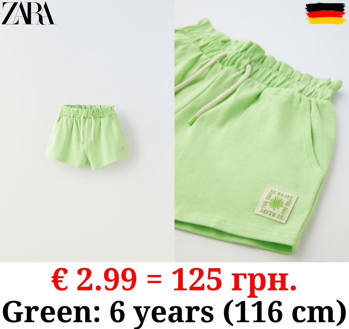 PLUSH BERMUDA SHORTS WITH LABEL DETAIL