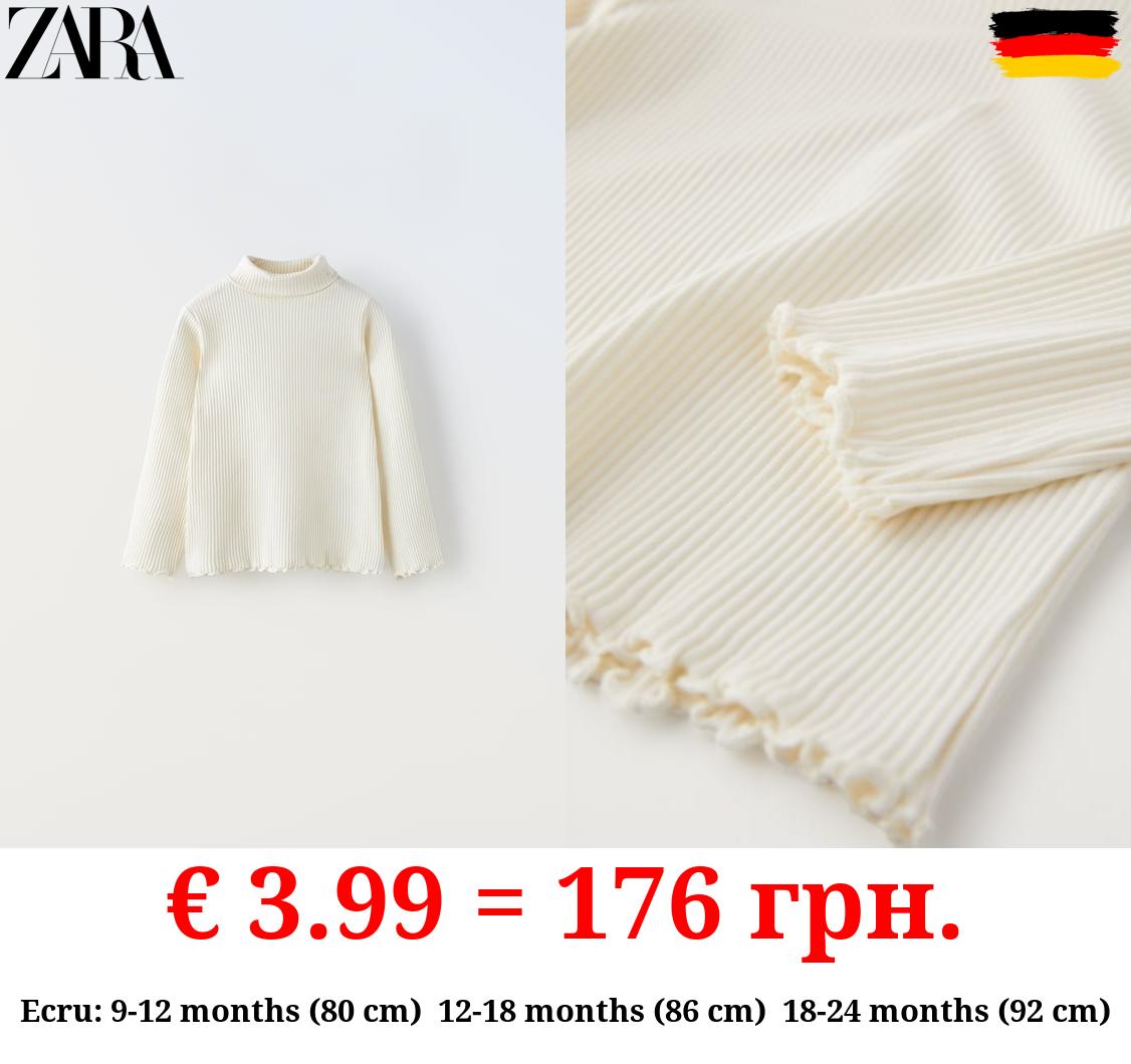 RIBBED TOP WITH SCALLOPED DETAILS