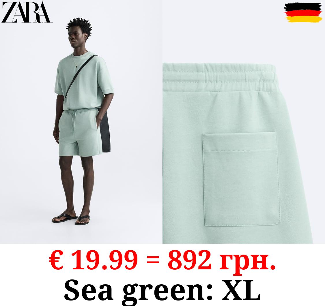 COMPACT JOGGER BERMUDA SHORTS