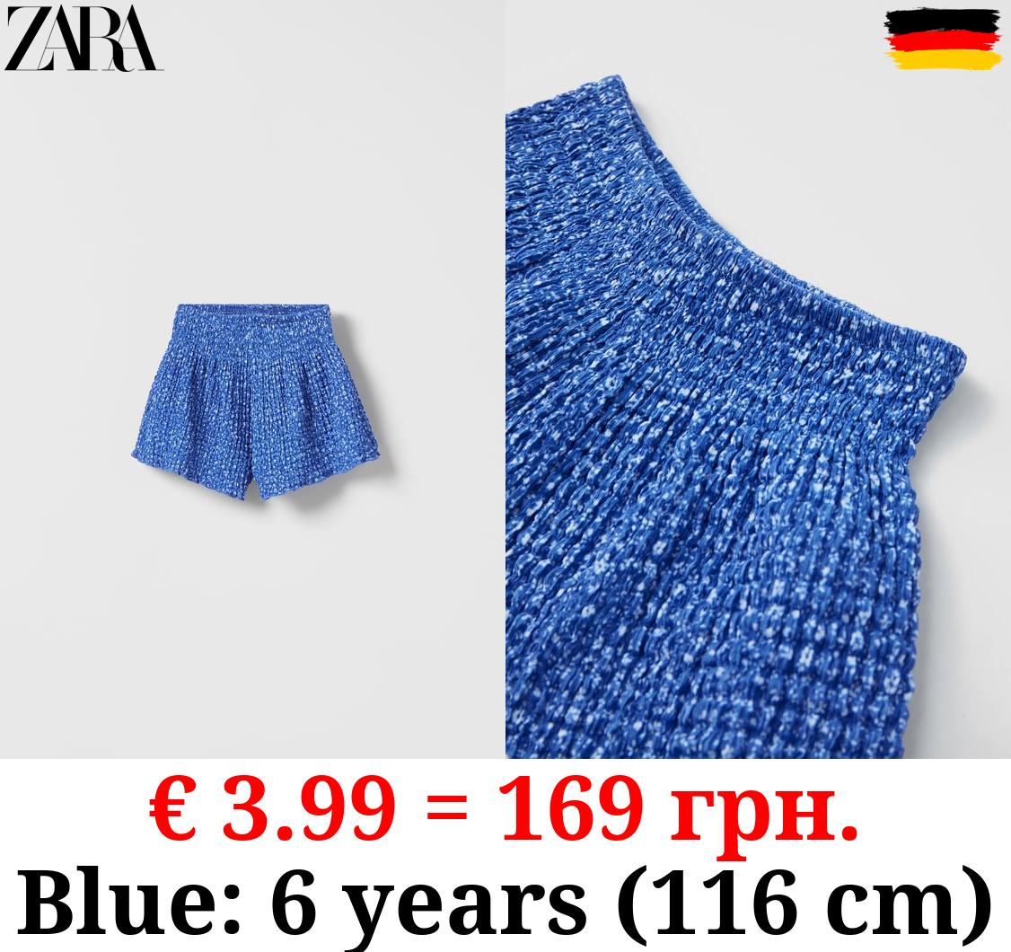 TEXTURED FLORAL BERMUDA SHORTS