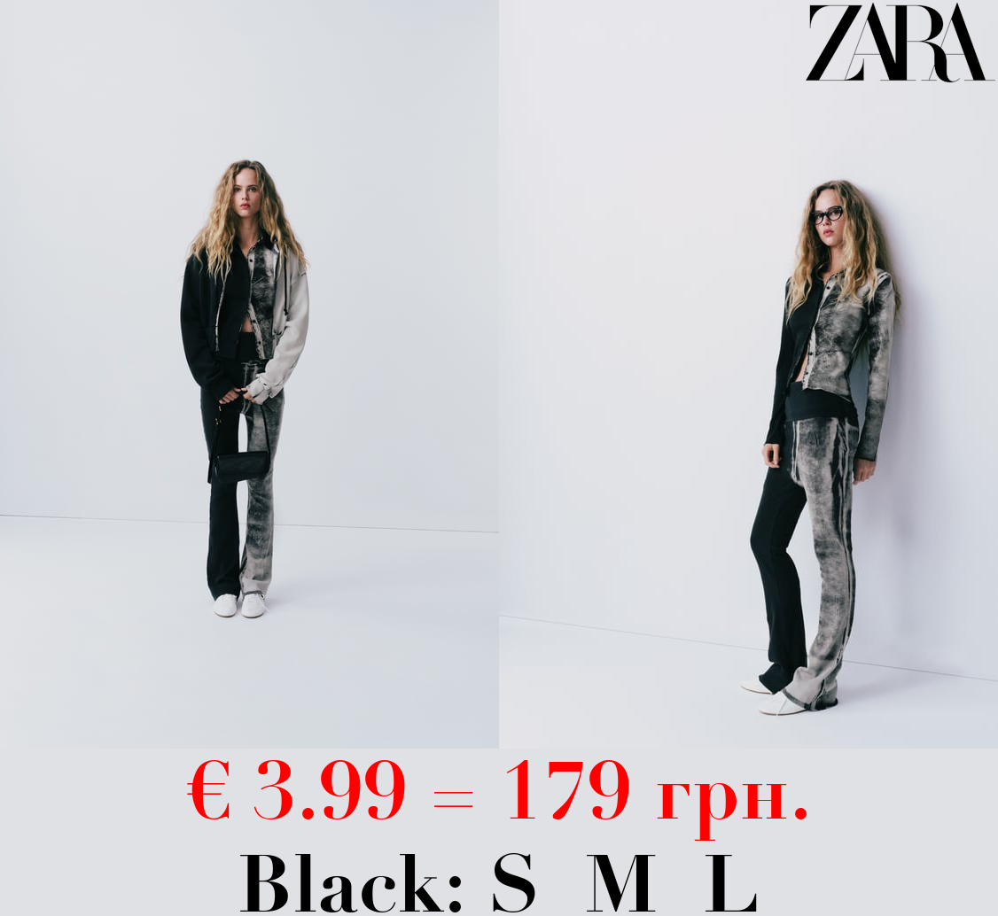 FADED-EFFECT RIBBED TROUSERS