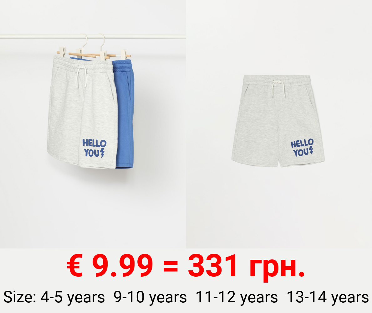 2-Pack of plain and slogan printed Bermuda shorts