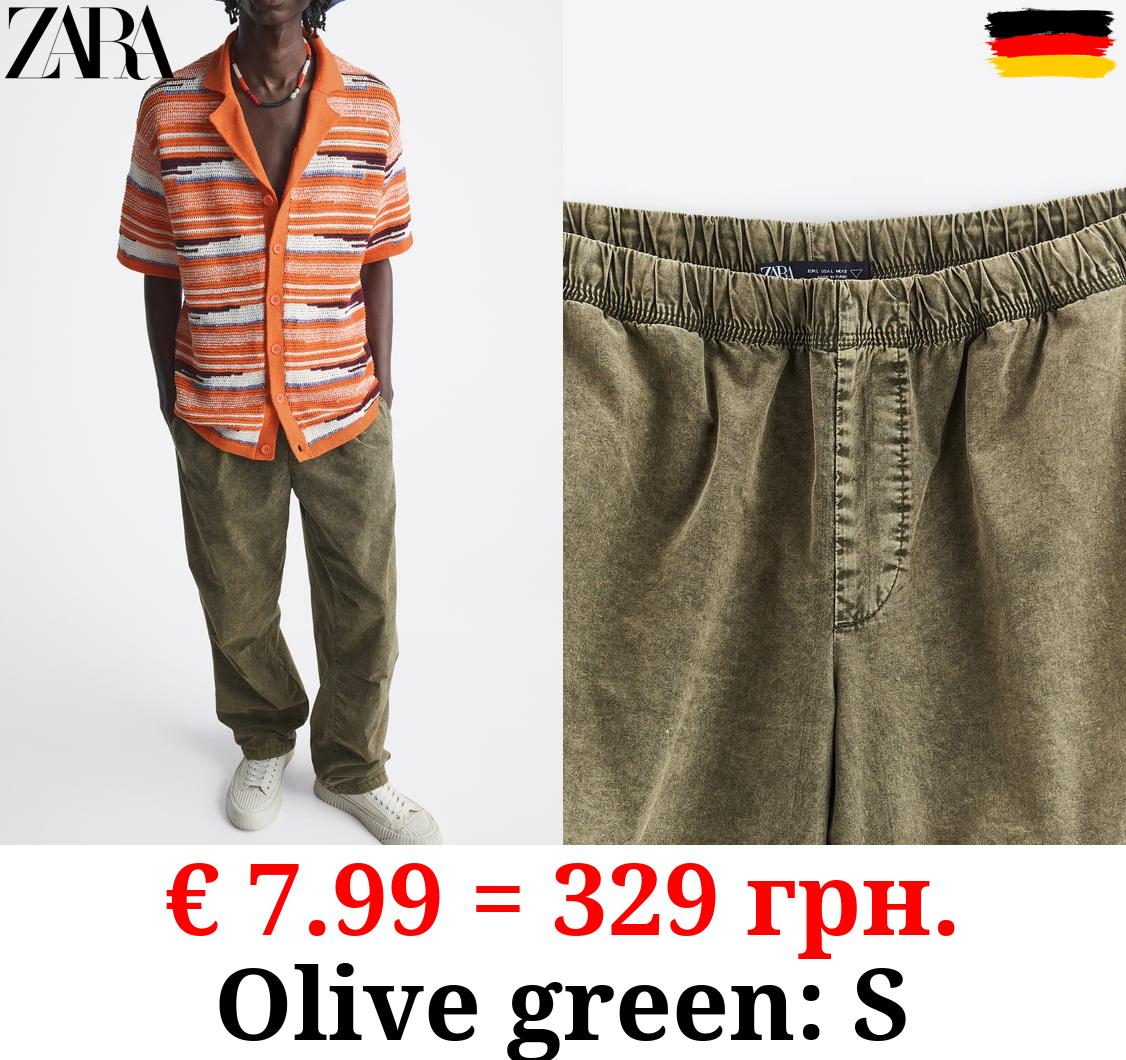 ACID WASH PARACHUTE TROUSERS