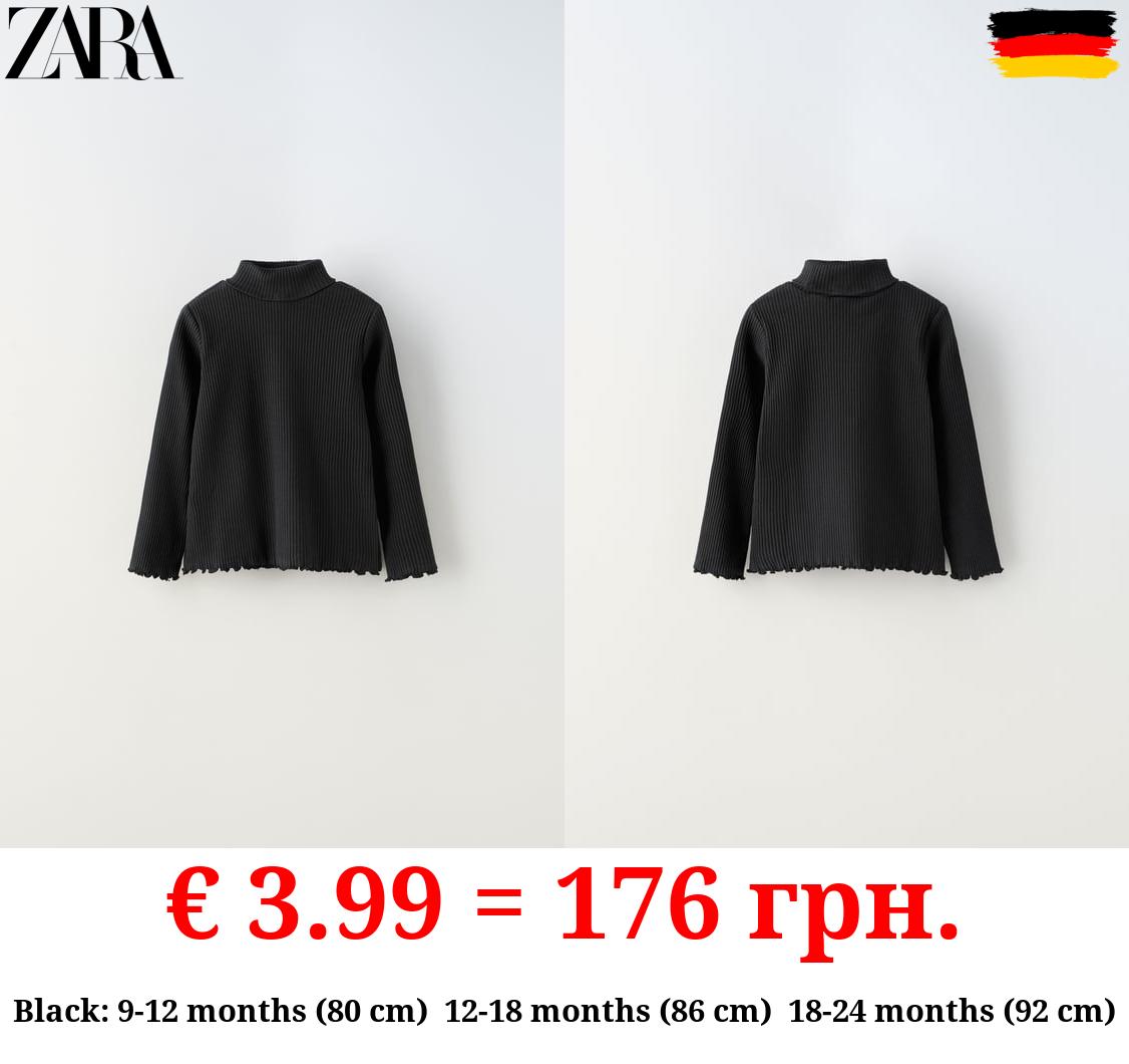 RIBBED TOP WITH SCALLOPED DETAILS