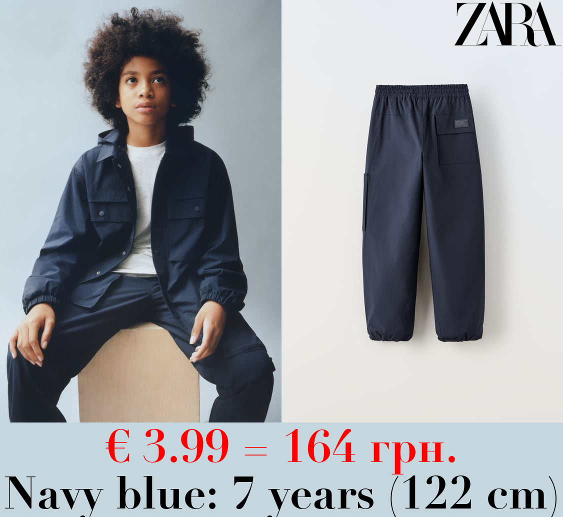 LINED NYLON TROUSERS