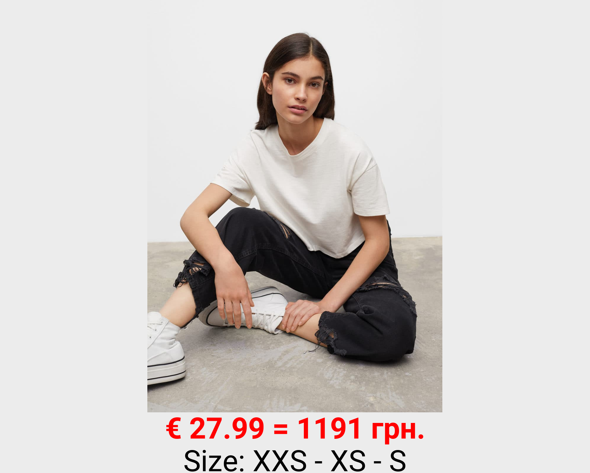 Jeans rectos bajo deshilachado