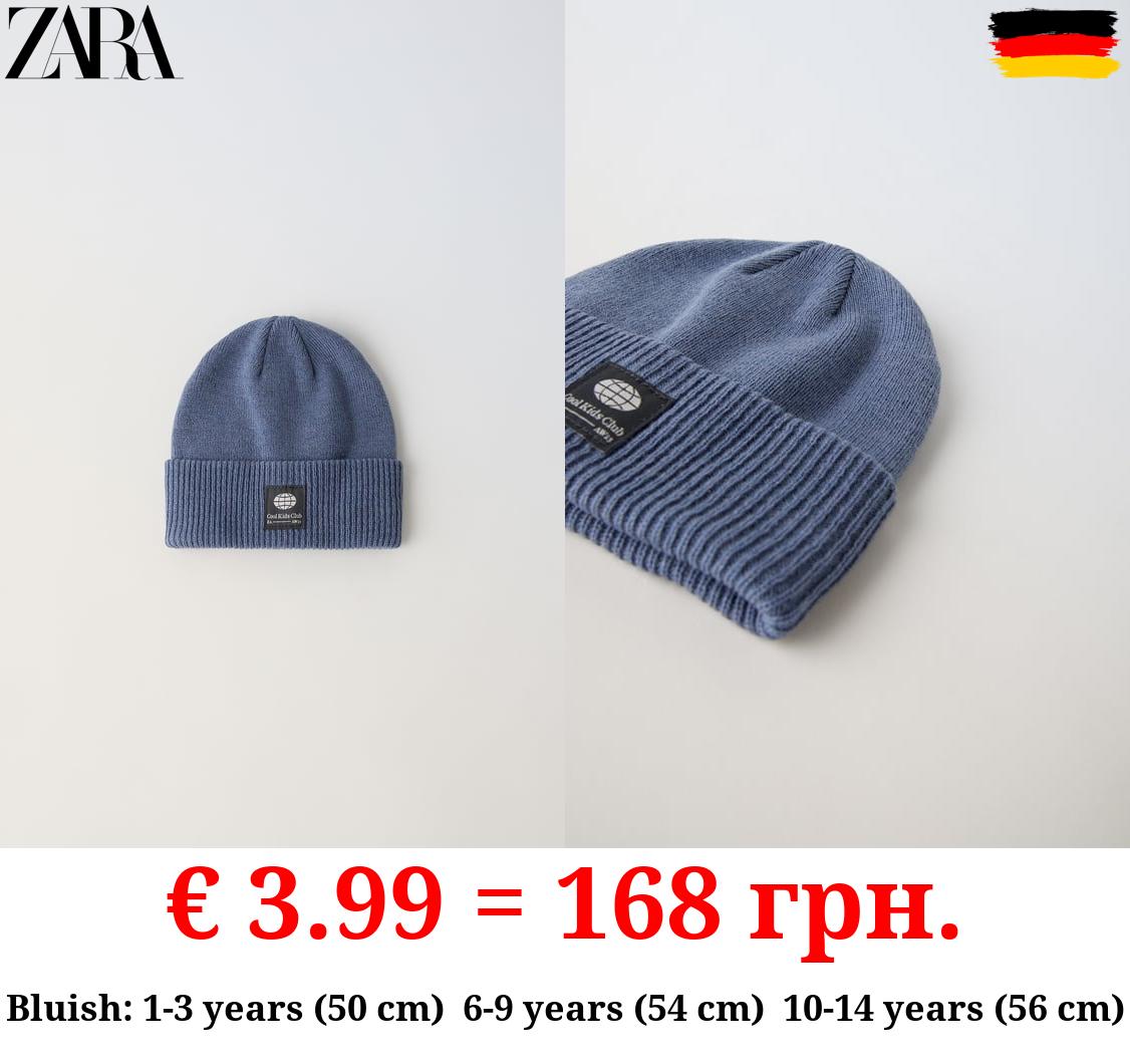 KNIT BEANIE WITH LABEL DETAIL