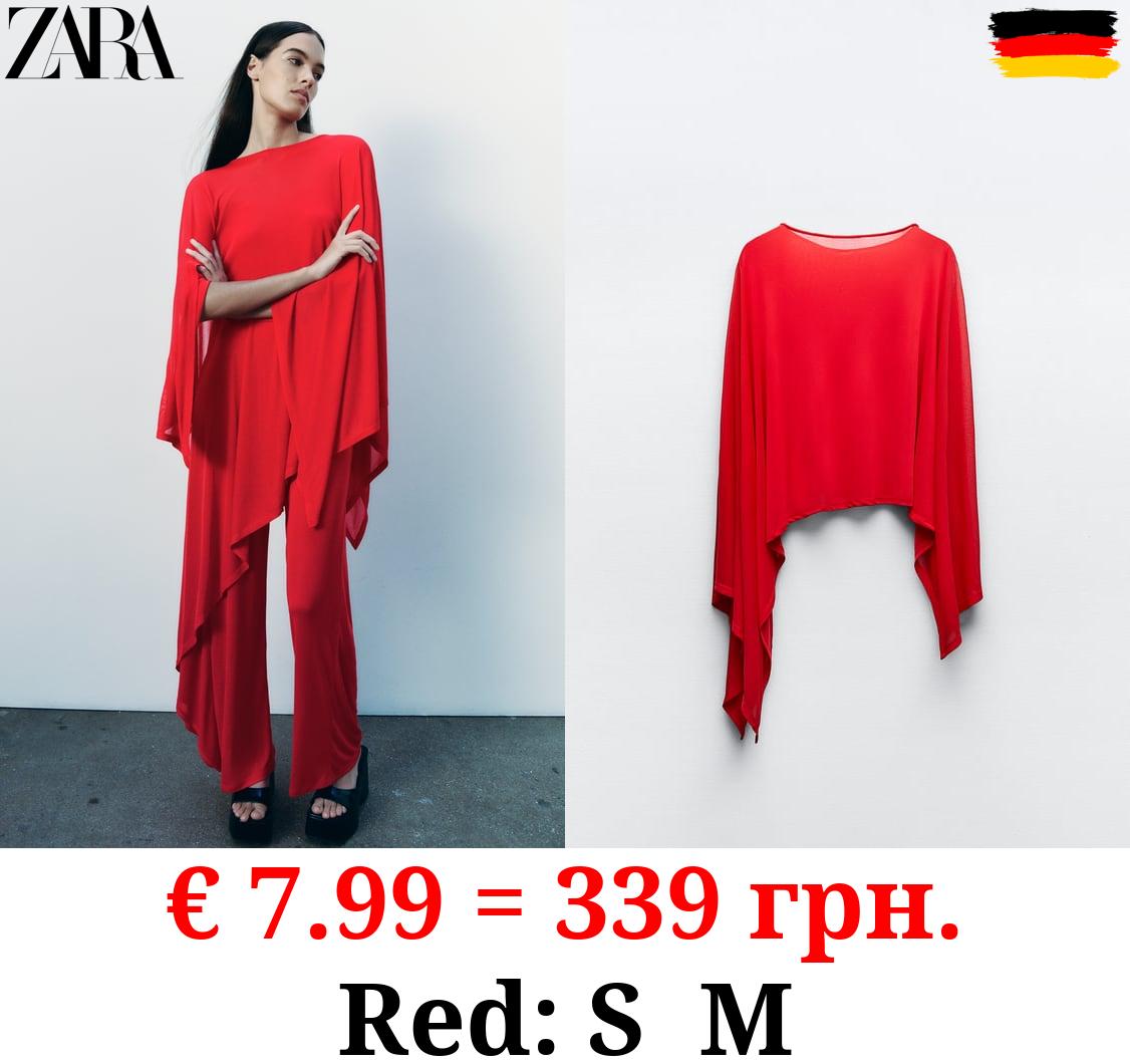 FLOWING ASYMMETRIC CAPE