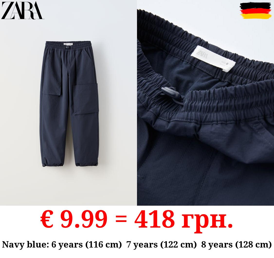 LINED NYLON TROUSERS