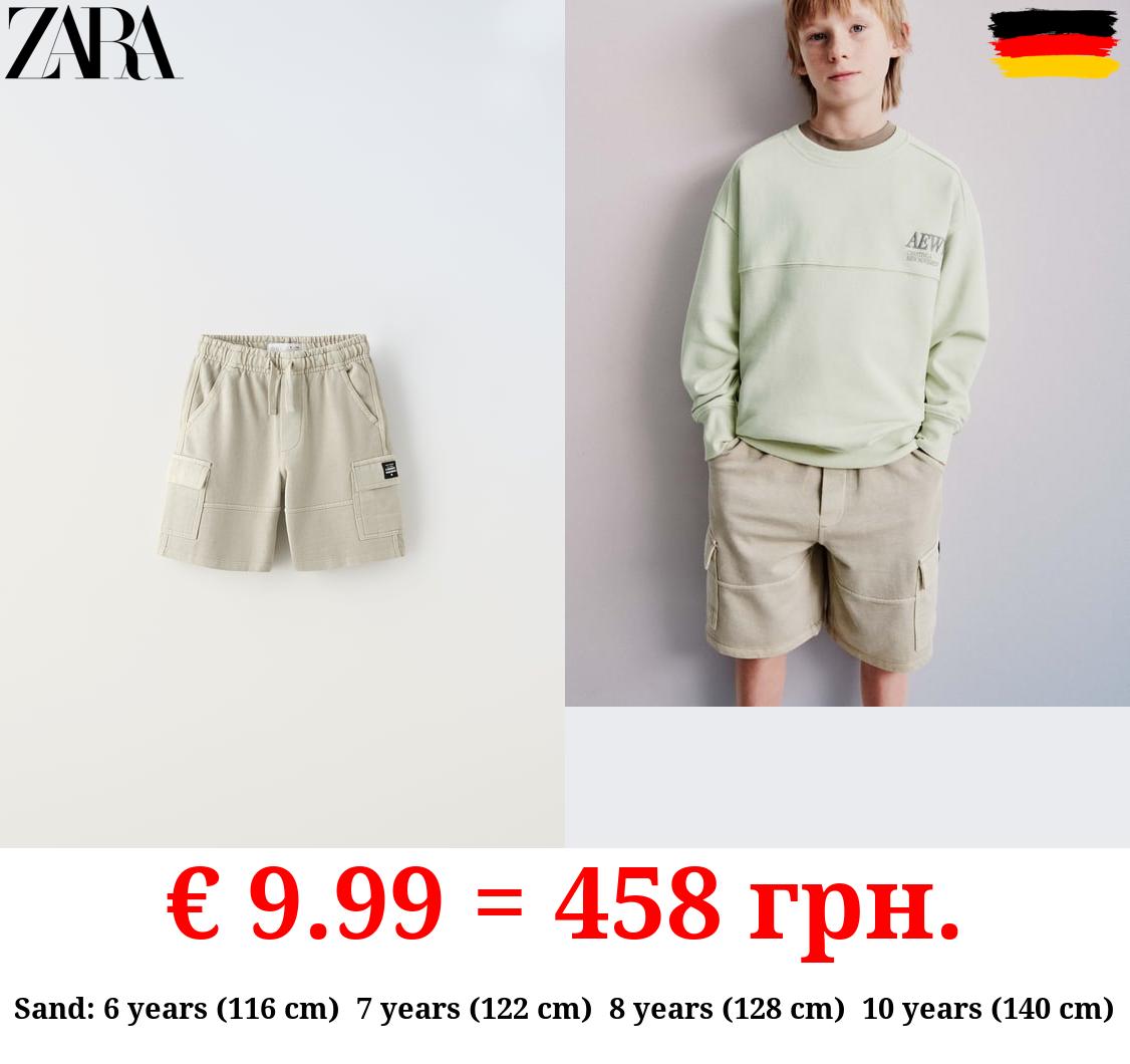 CARGO BERMUDA SHORTS WITH LABEL