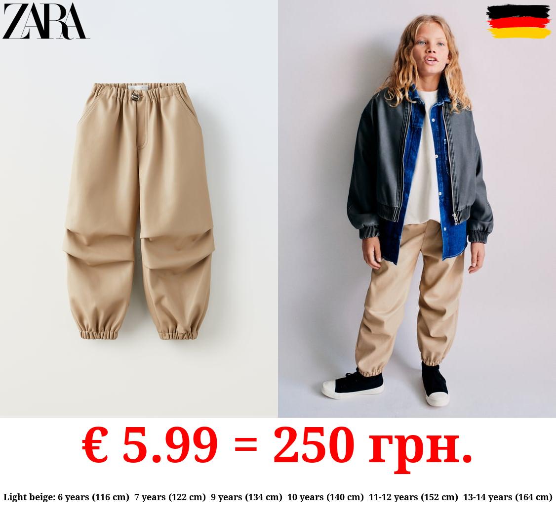 FAUX LEATHER PARACHUTE TROUSERS