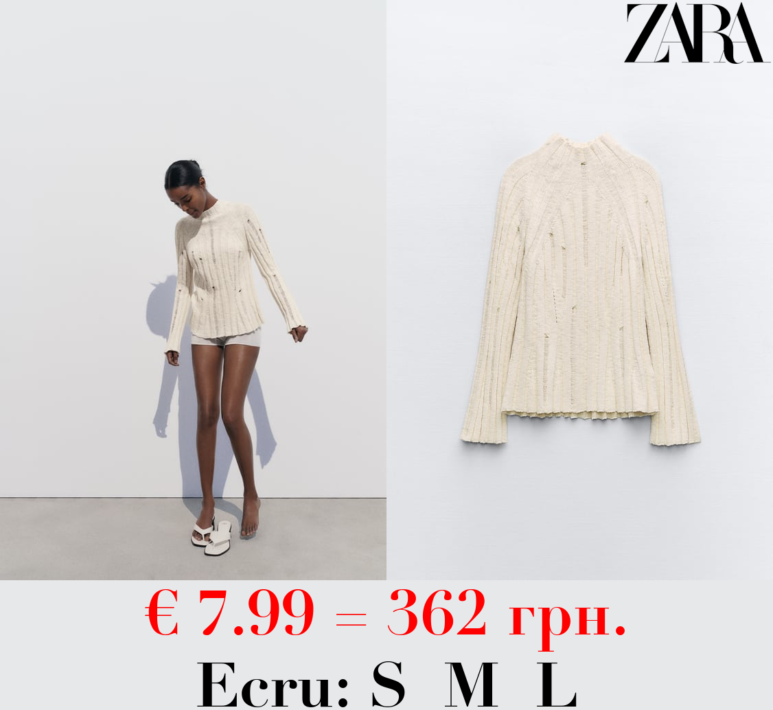 RIBBED KNIT SWEATER WITH RIPS