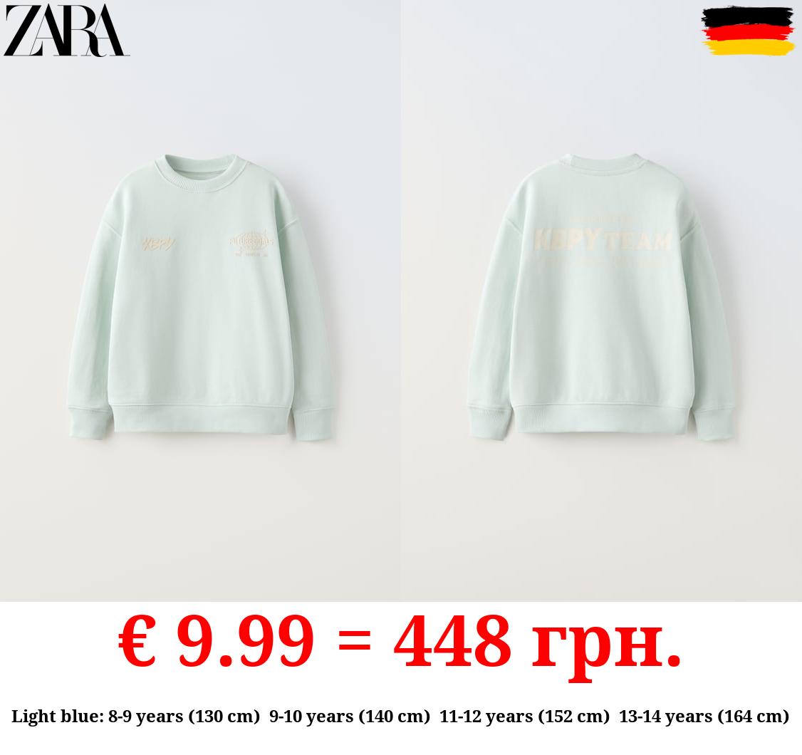 SWEATSHIRT WITH RAISED SLOGAN