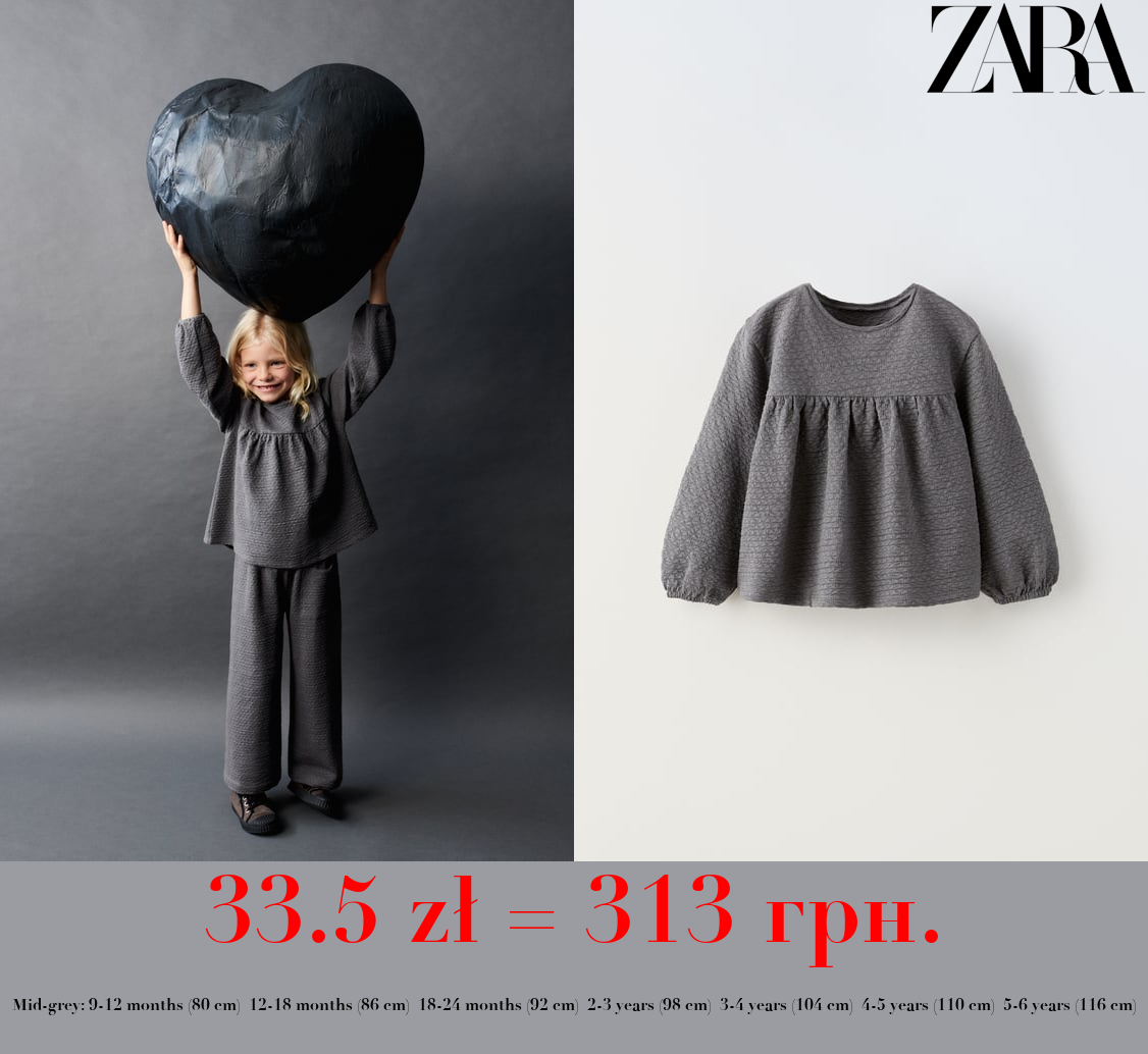 TEXTURED OVERSIZE BLOUSE