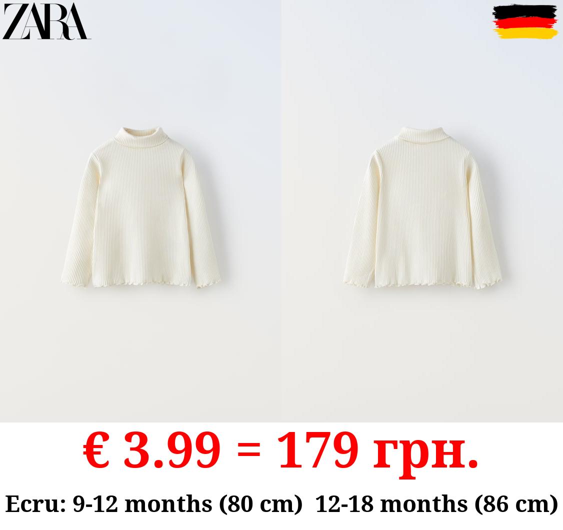 RIBBED TOP WITH SCALLOPED DETAILS