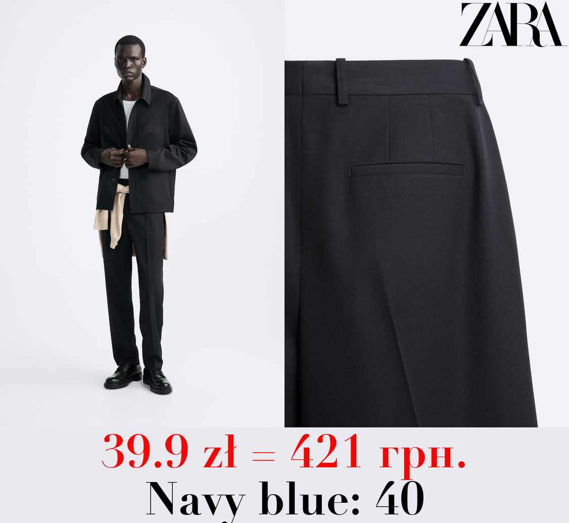 PLEATED TROUSERS
