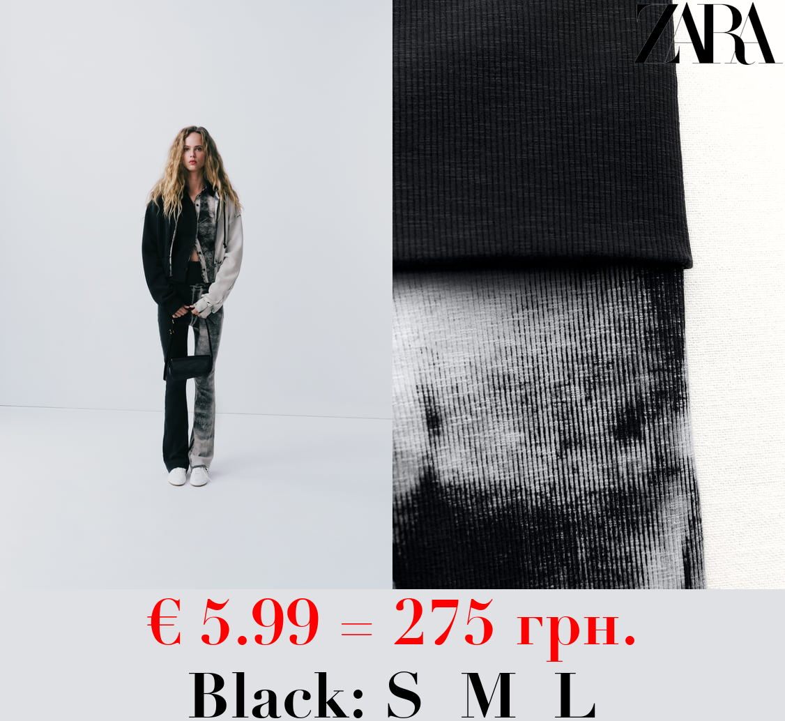 FADED-EFFECT RIBBED TROUSERS