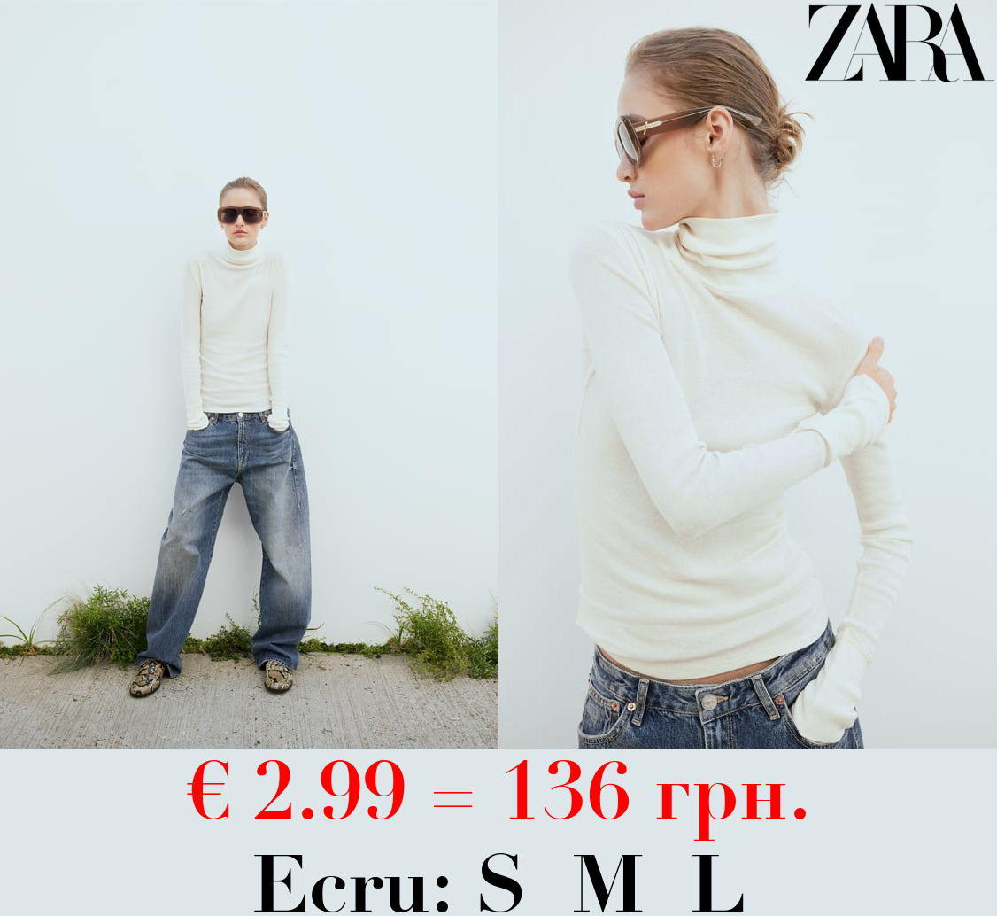 SEMI-SHEER DELICATE COTTON TOP WITH CUFFS AND SEAM DETAIL