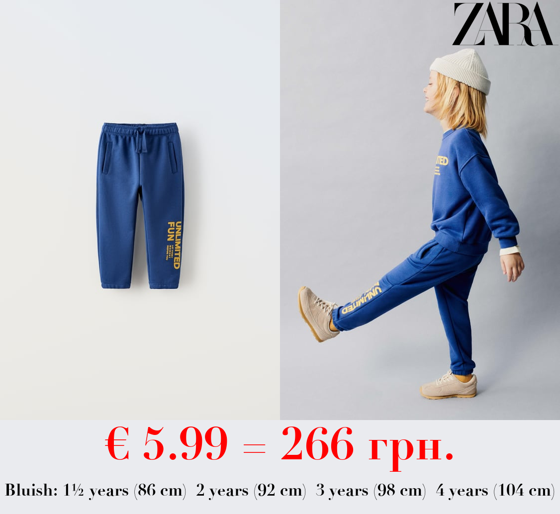 PLUSH TROUSERS WITH RAISED SLOGAN