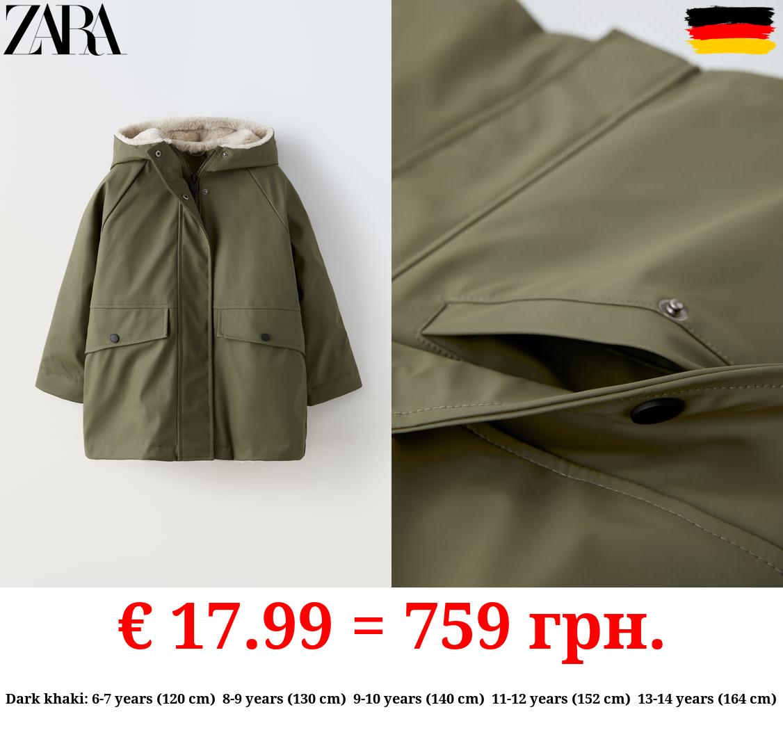 RUBBERISED RAINCOAT WITH FAUX FUR