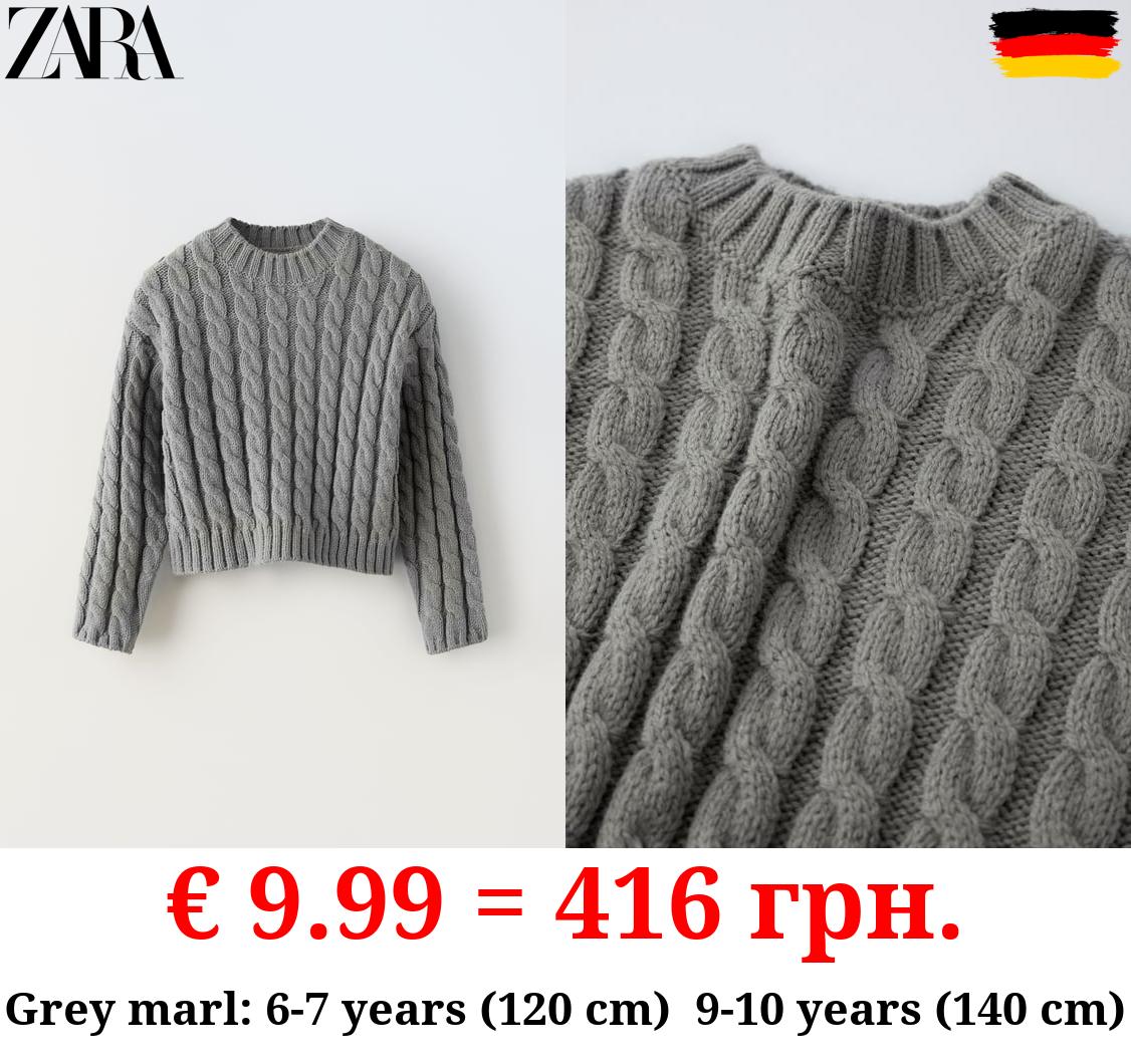 CROPPED CABLE-KNIT SWEATER