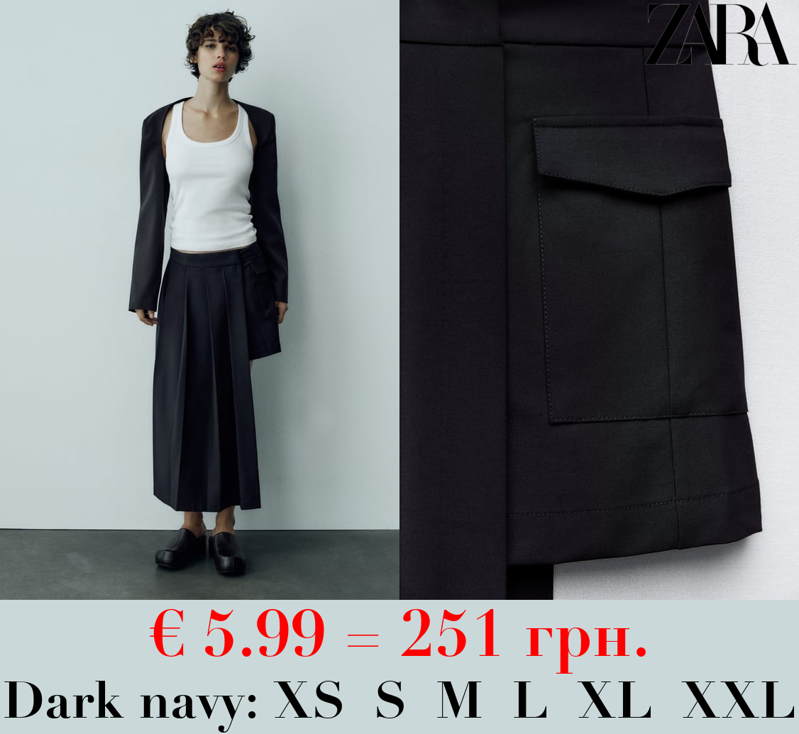 ASYMMETRIC BOX PLEAT SKIRT