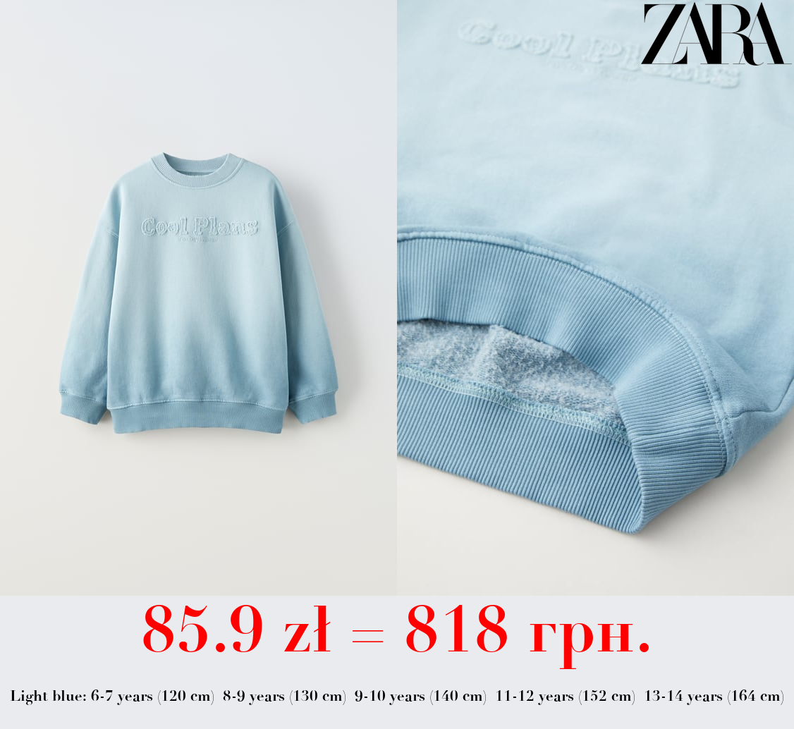 SWEATSHIRT WITH SLOGAN PATCH