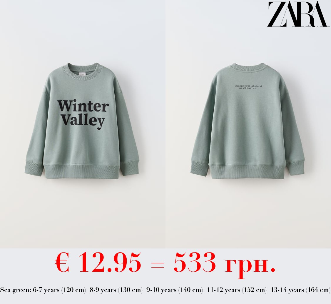 FLOCKED SLOGAN SWEATSHIRT