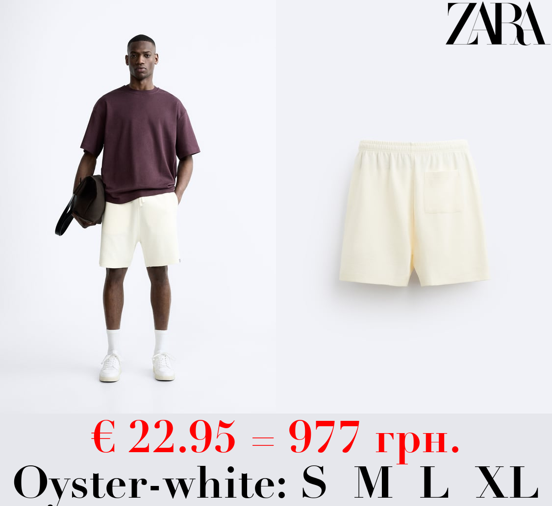 TEXTURED BERMUDA SHORTS WITH LABEL