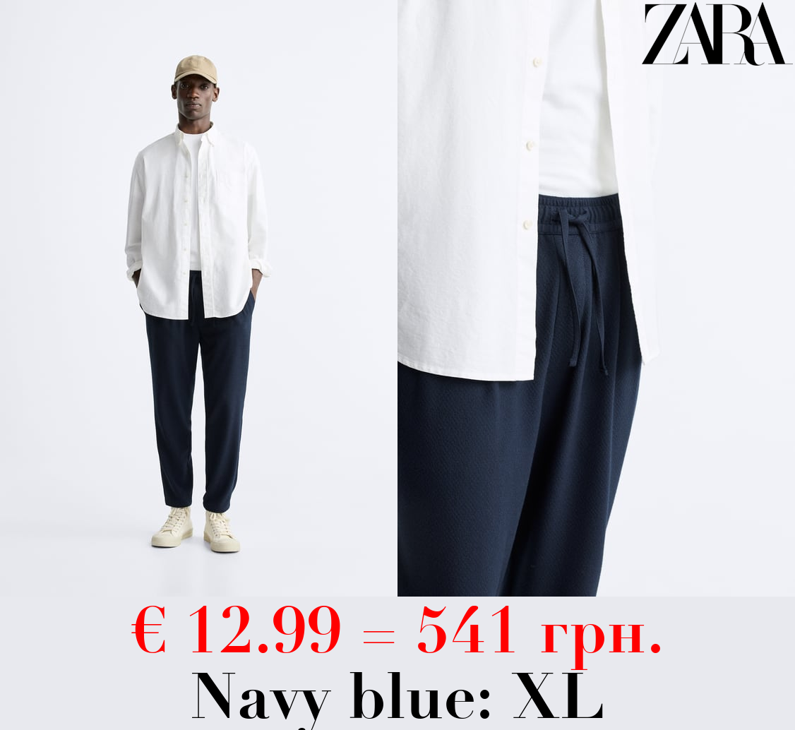 TEXTURED COTTON TROUSERS