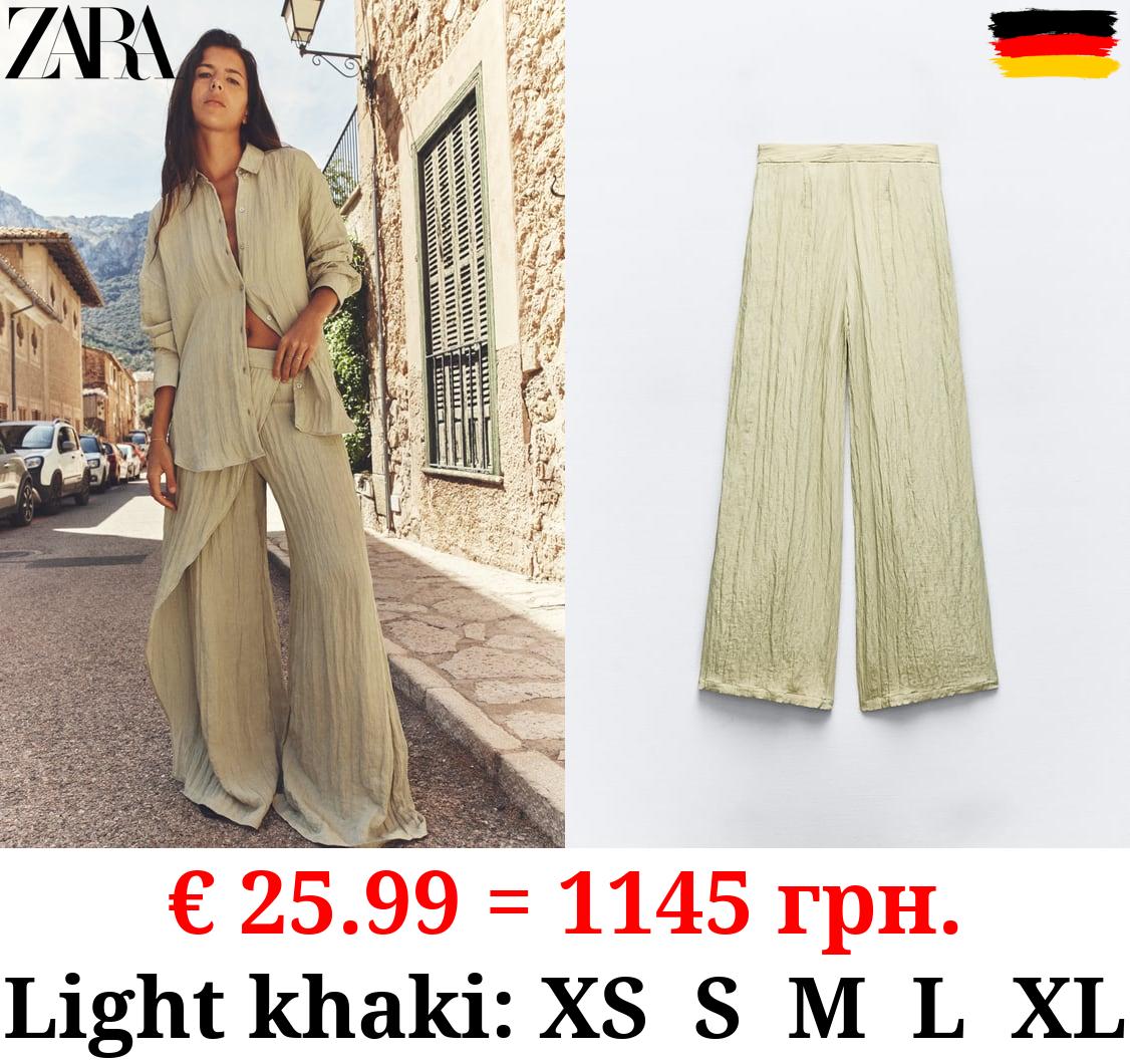 CREASED-EFFECT WRAP TROUSERS