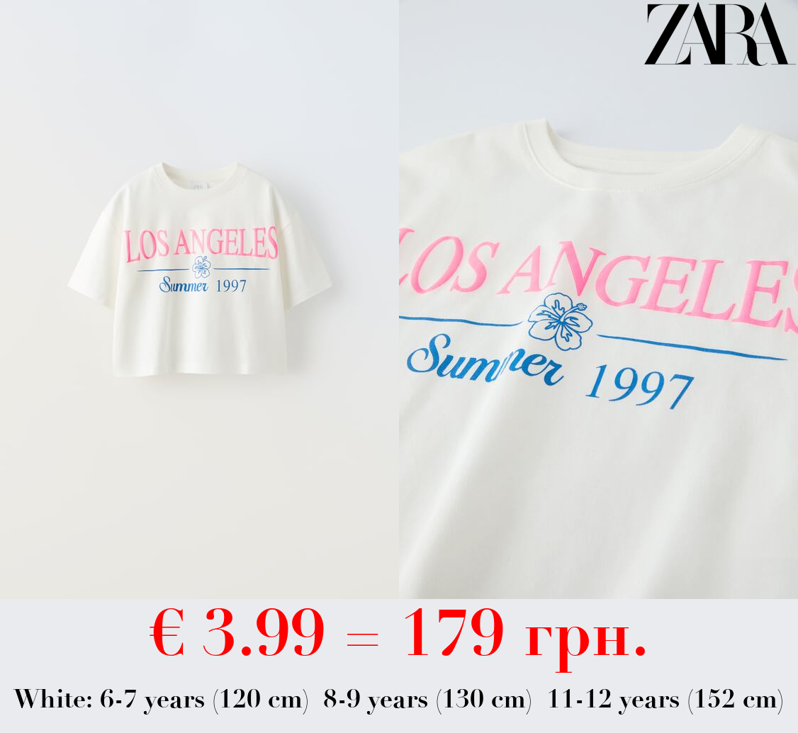 T-SHIRT WITH PRINTED RAISED SLOGAN